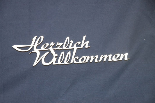 Schriftzug "Herzlich Willkommen"